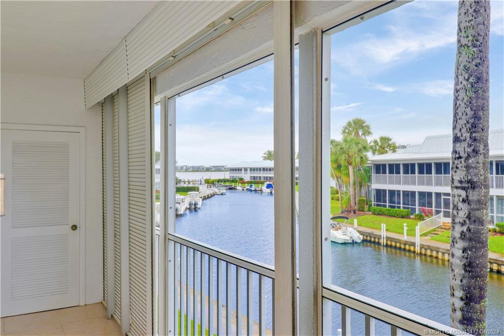 1864 Southwest Palm City Road, Unit 202 Stuart, FL 34994 - Photo 25 of 29 River Views from lanai