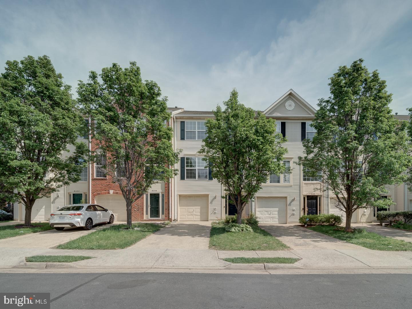 8241 Humphrey Lane Manassas, VA 20109 - Photo 1 of 55 a front view of a house with a garden and plants