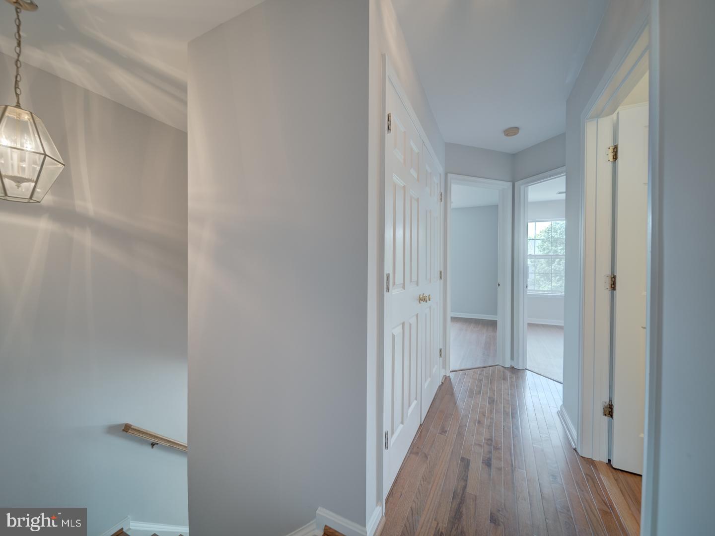 8241 Humphrey Lane Manassas, VA 20109 - Photo 28 of 55 a view of a hallway with wooden floor