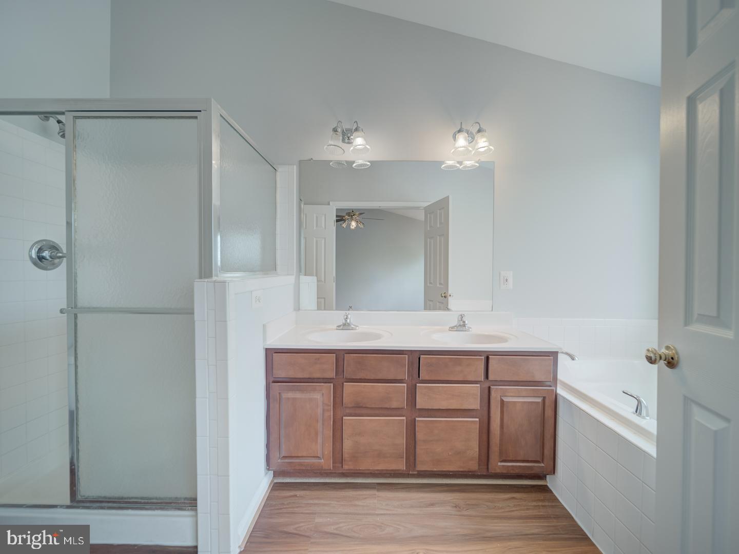 8241 Humphrey Lane Manassas, VA 20109 - Photo 34 of 55 a bathroom with a sink and a mirror