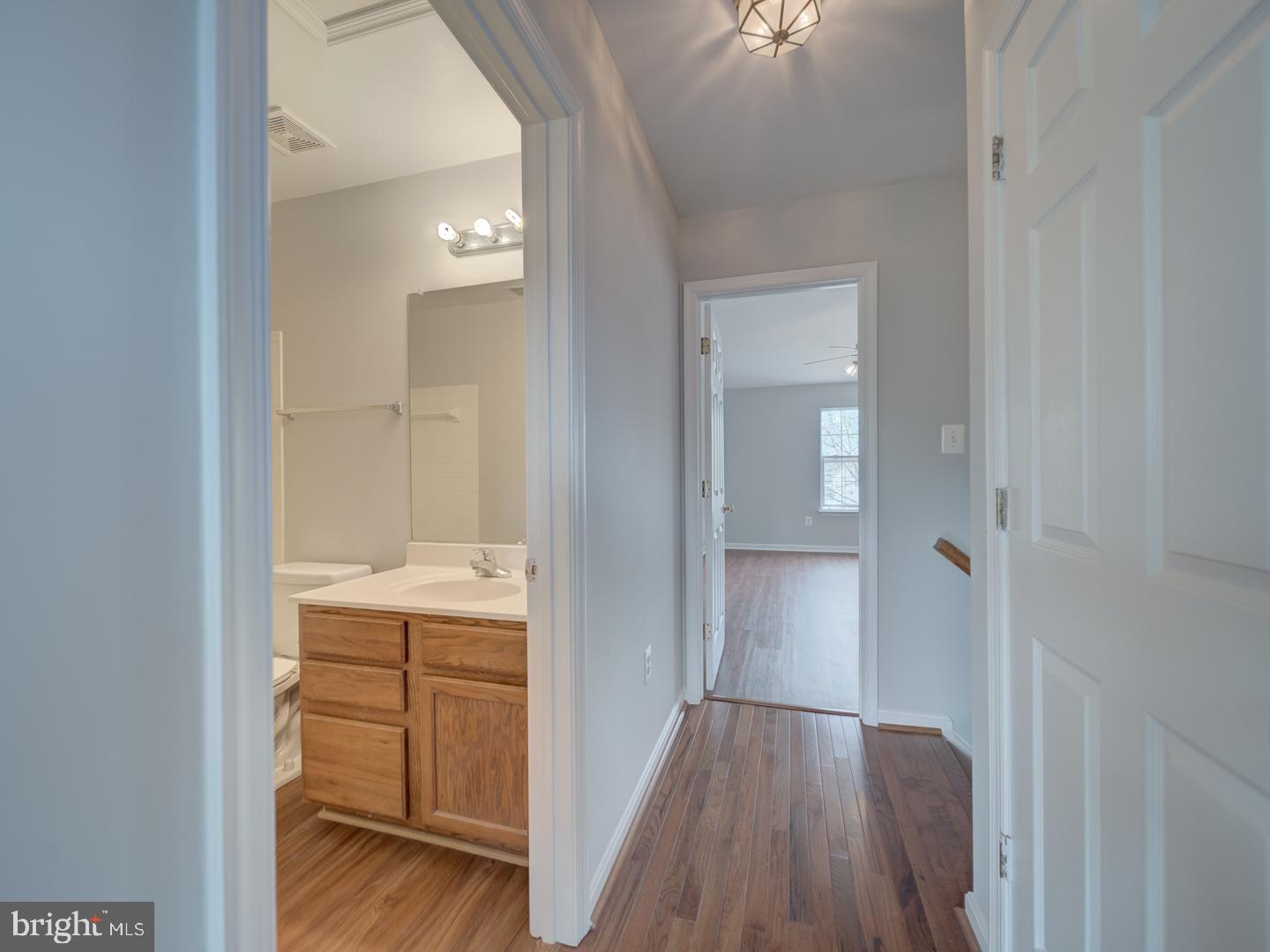 8241 Humphrey Lane Manassas, VA 20109 - Photo 47 of 55 a view of a hallway with wooden floor