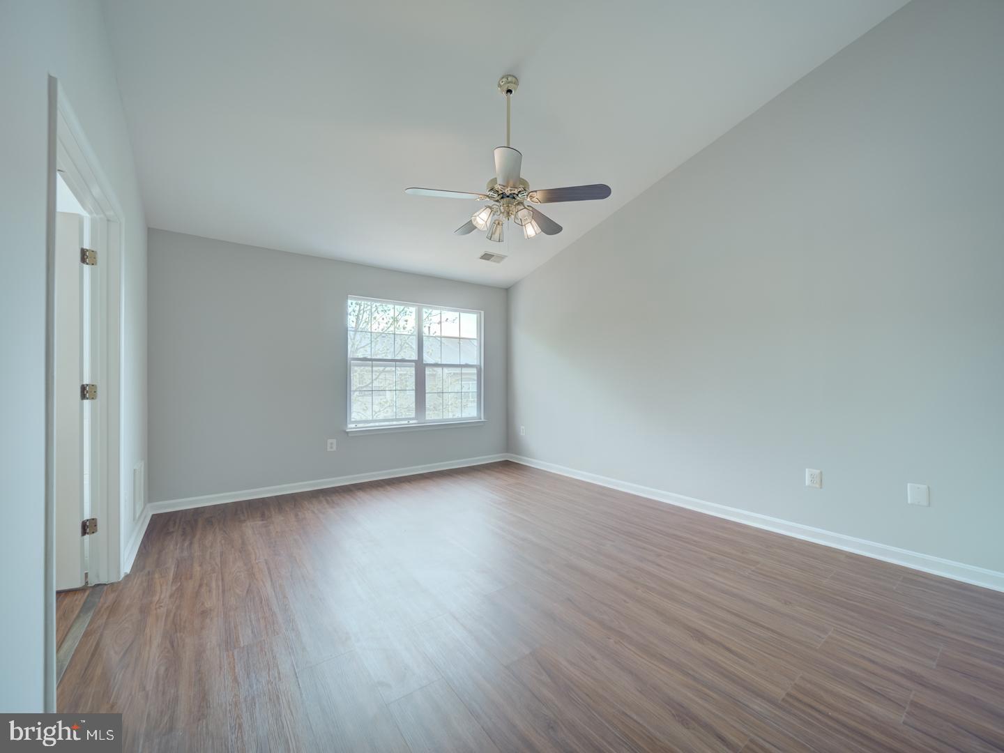 8241 Humphrey Lane Manassas, VA 20109 - Photo 51 of 55 wooden floor in an empty room with a window