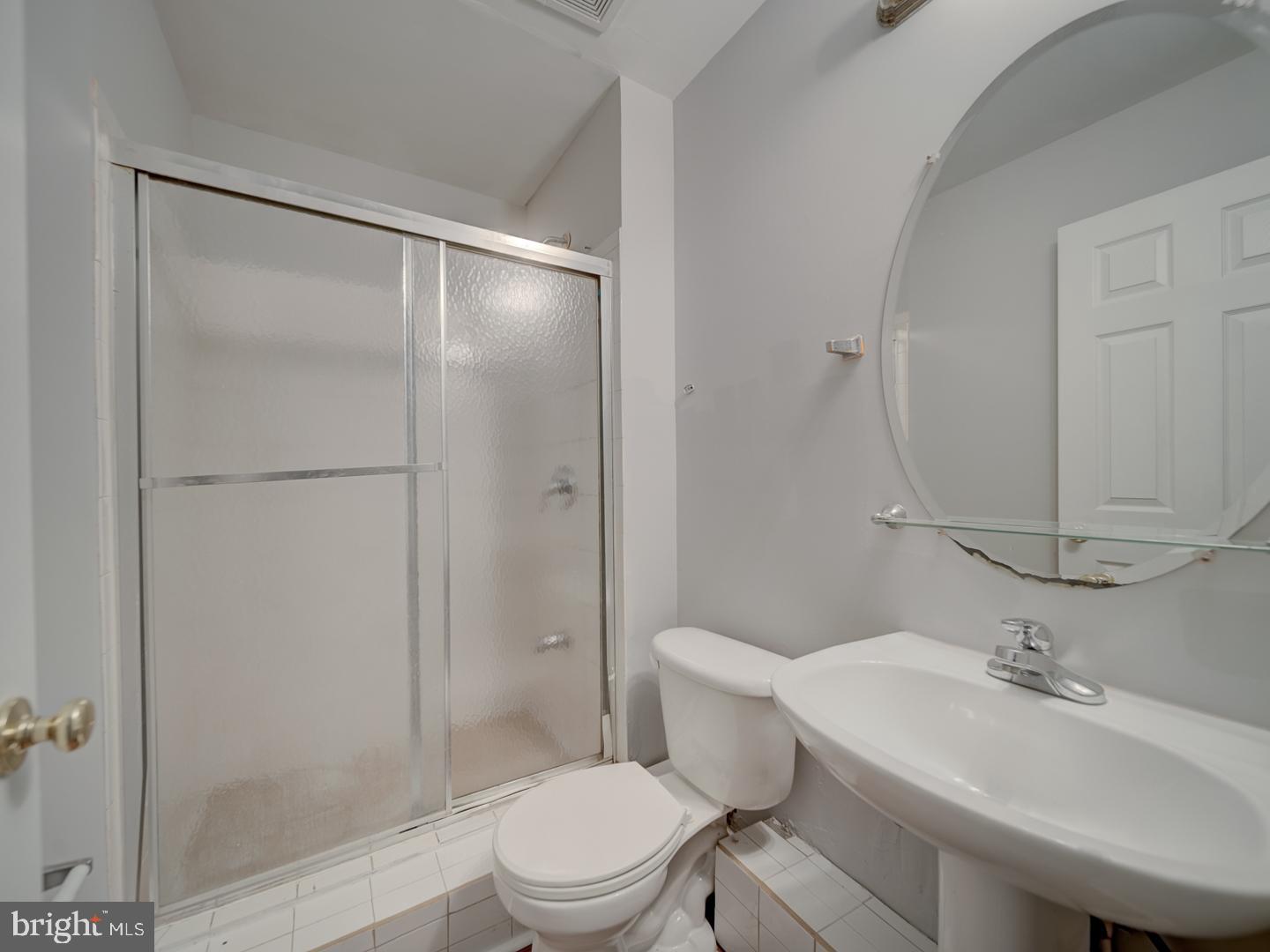 8241 Humphrey Lane Manassas, VA 20109 - Photo 54 of 55 a bathroom with a sink toilet and shower
