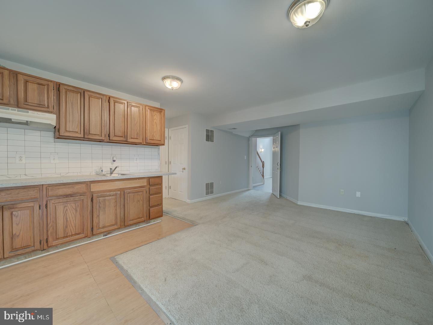 8241 Humphrey Lane Manassas, VA 20109 - Photo 8 of 55 a view of a kitchen with a sink