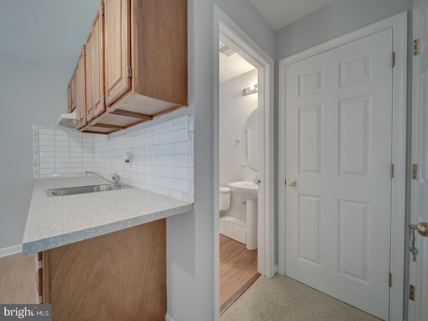 8241 Humphrey Lane Manassas, VA 20109 - Photo 10 of 55 a bathroom with a sink and a mirror