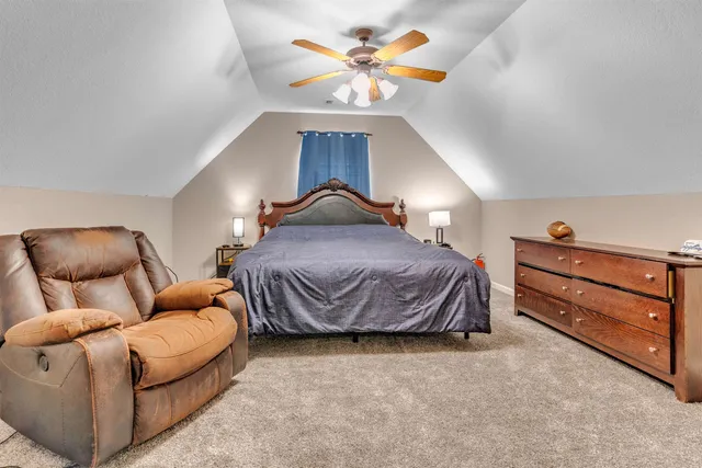 a bedroom with a bed and closet