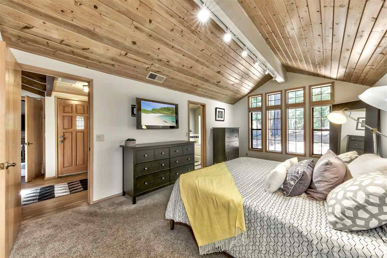 11576 Chamonix Road Truckee, CA 96161 - Photo 11 of 21 a bedroom with a bed and a dresser