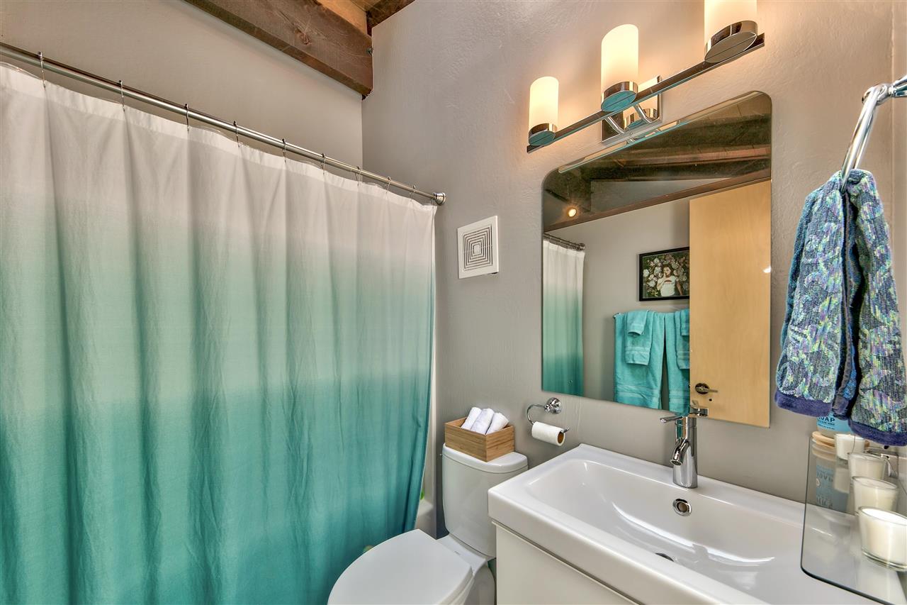 11576 Chamonix Road Truckee, CA 96161 - Photo 14 of 21 a bathroom with a sink and a mirror