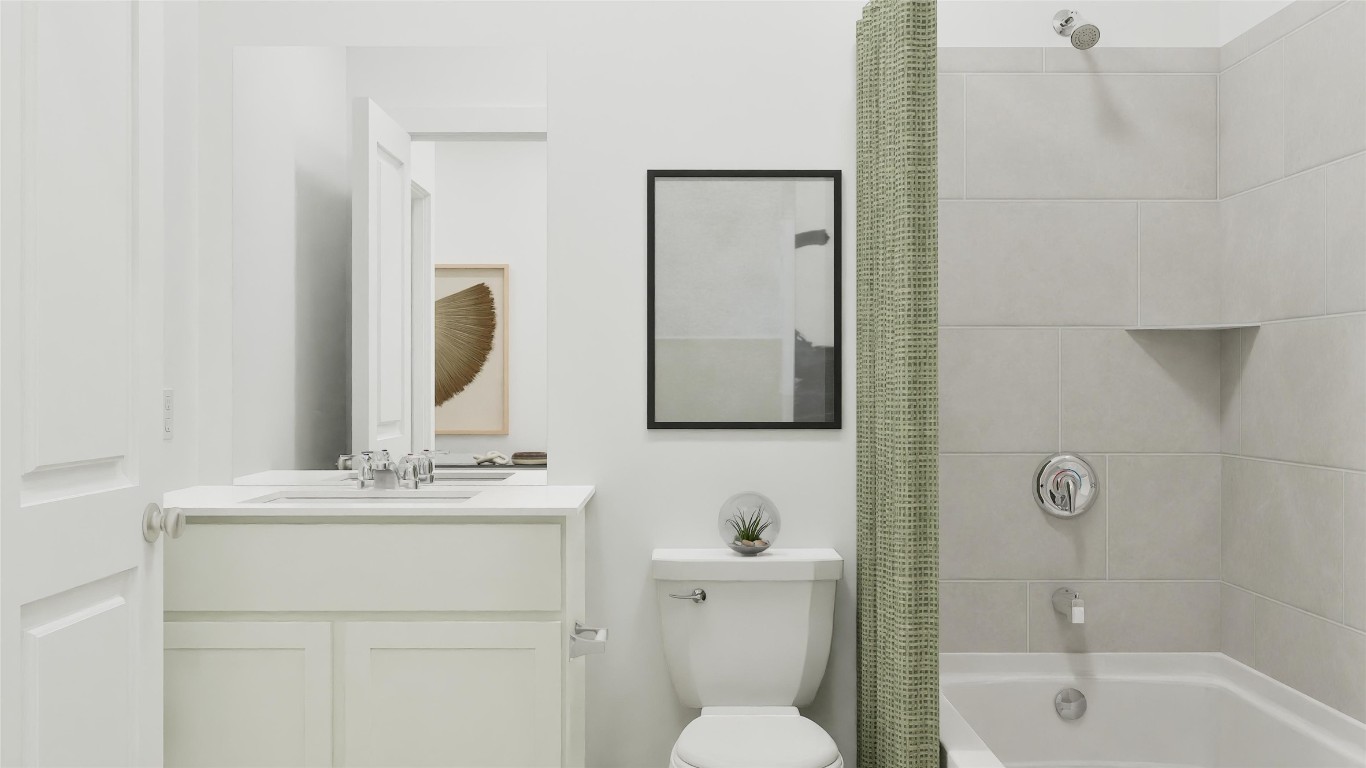 13301 Winton Drive Elgin, TX 78621 - Photo 16 of 25 a bathroom with a bathtub shower sink vanity mirror and toilet