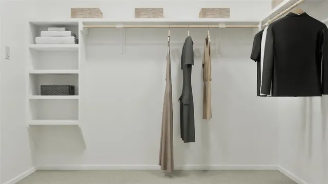 a view of a workspace with furniture and a potted plant