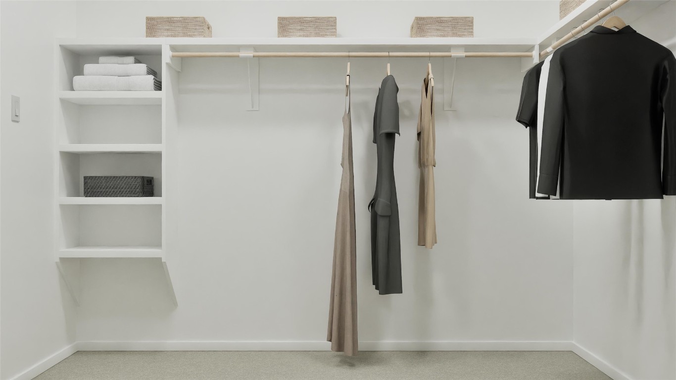 13301 Winton Drive Elgin, TX 78621 - Photo 23 of 25 a view of walk in closet with empty racks