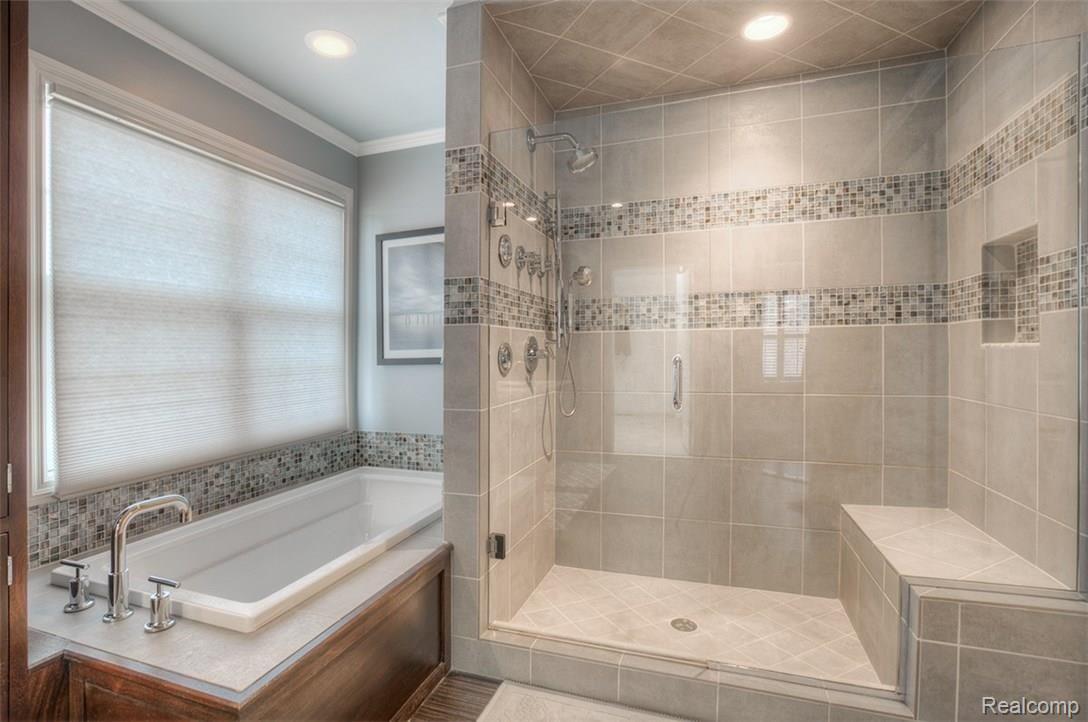 756 Loggers Circle Rochester, MI 48307 - Photo 26 of 39 Every design detail is exquisite! From the modern chrome fixtures, detailed tile work and tasteful quartz counters. The spectacular two-person shower needs to be experienced!