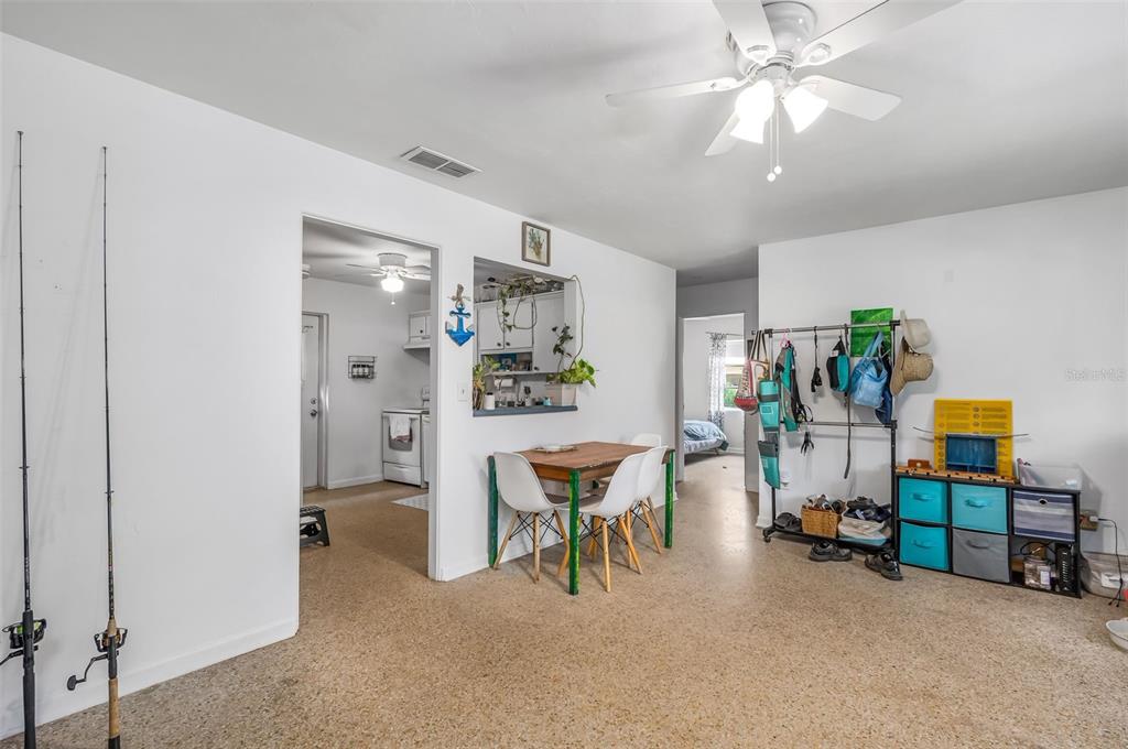 331 Hernando Street, Unit S 123 Fort Pierce, FL 34949 - Photo 12 of 52 a view of a livingroom with furniture and a chandelier