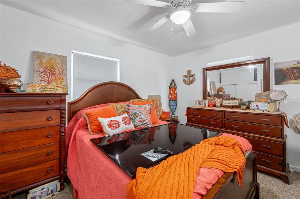 331 Hernando Street, Unit S 123 Fort Pierce, FL 34949 - Photo 20 of 52 a bedroom with a bed and window