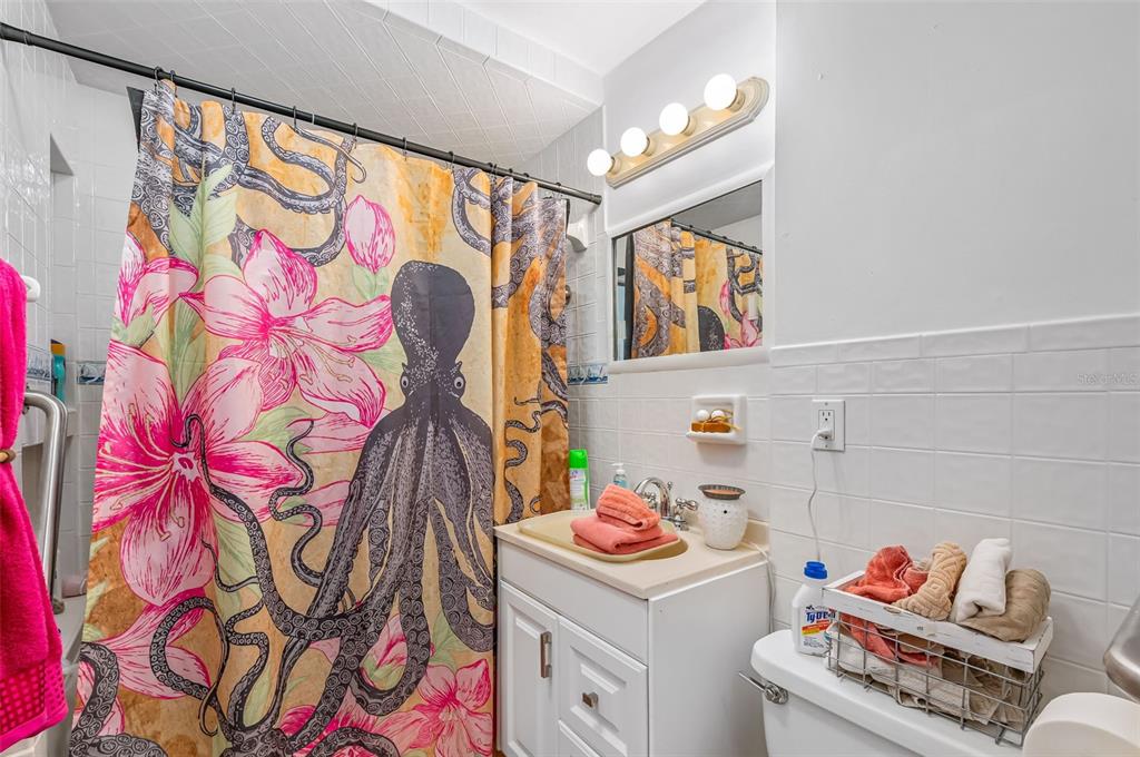 331 Hernando Street, Unit S 123 Fort Pierce, FL 34949 - Photo 21 of 52 a utility room with a sink and couch