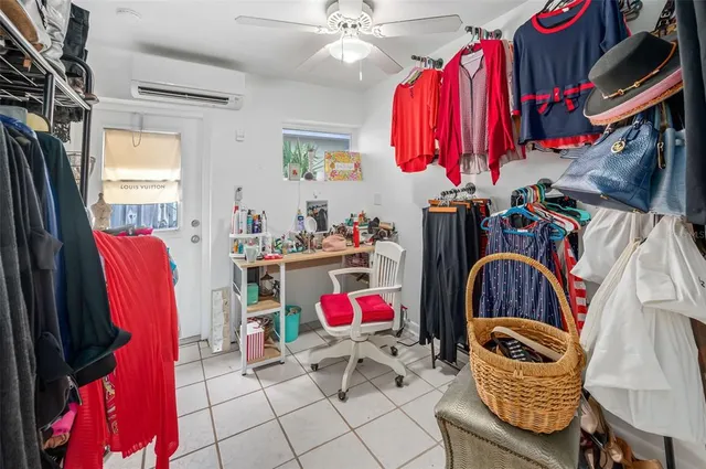 a kitchen with stainless steel appliances a sink and a refrigerator