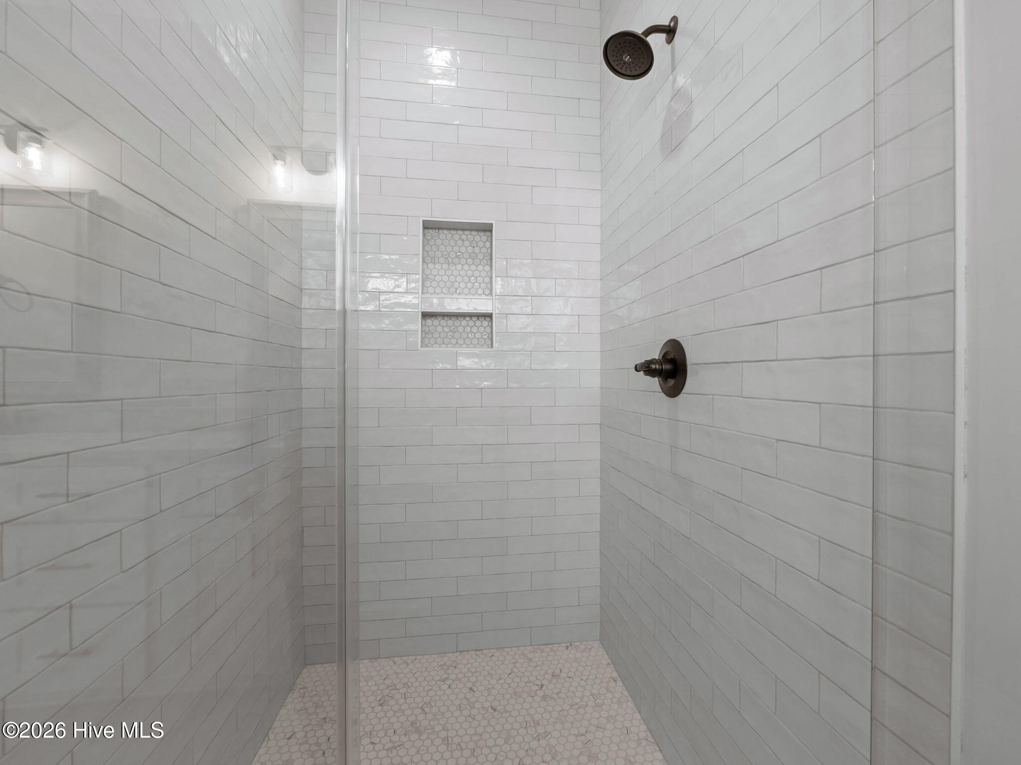 201 Coastline Circle Cedar Point, NC 28584 - Photo 25 of 68 Tiled walk in shower with frameless glass shower