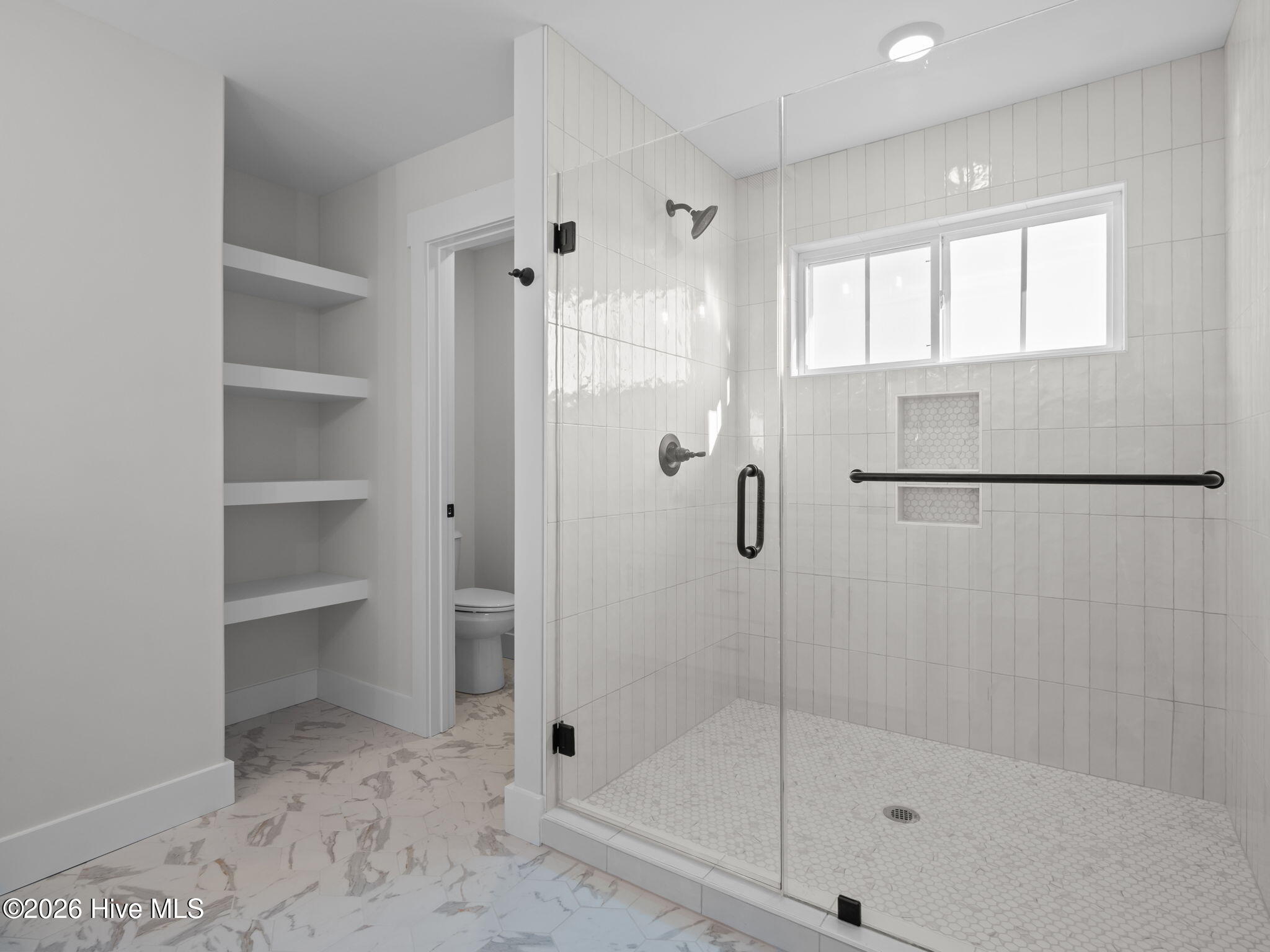 201 Coastline Circle Cedar Point, NC 28584 - Photo 31 of 68 Tile walk in shower with frameless glass