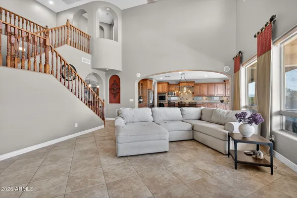 a view of living room kitchen with furniture and stove