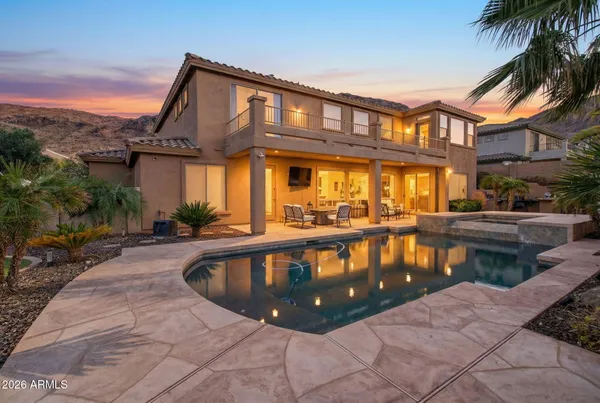 a front view of a house with swimming pool