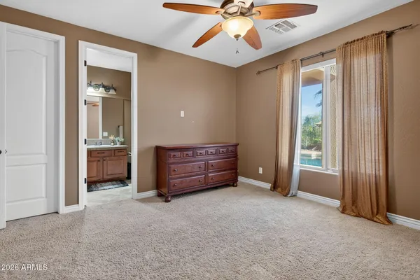 a utility room with sink dryer and washer
