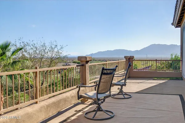 a outdoor living space with furniture and a large window