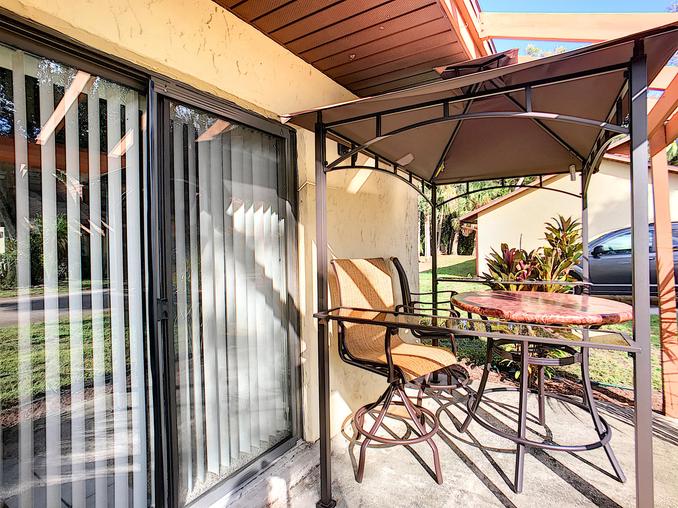 1120 Gary Hunt Road, Unit 3D Cocoa, FL 32926 - Photo 2 of 16 Front patio