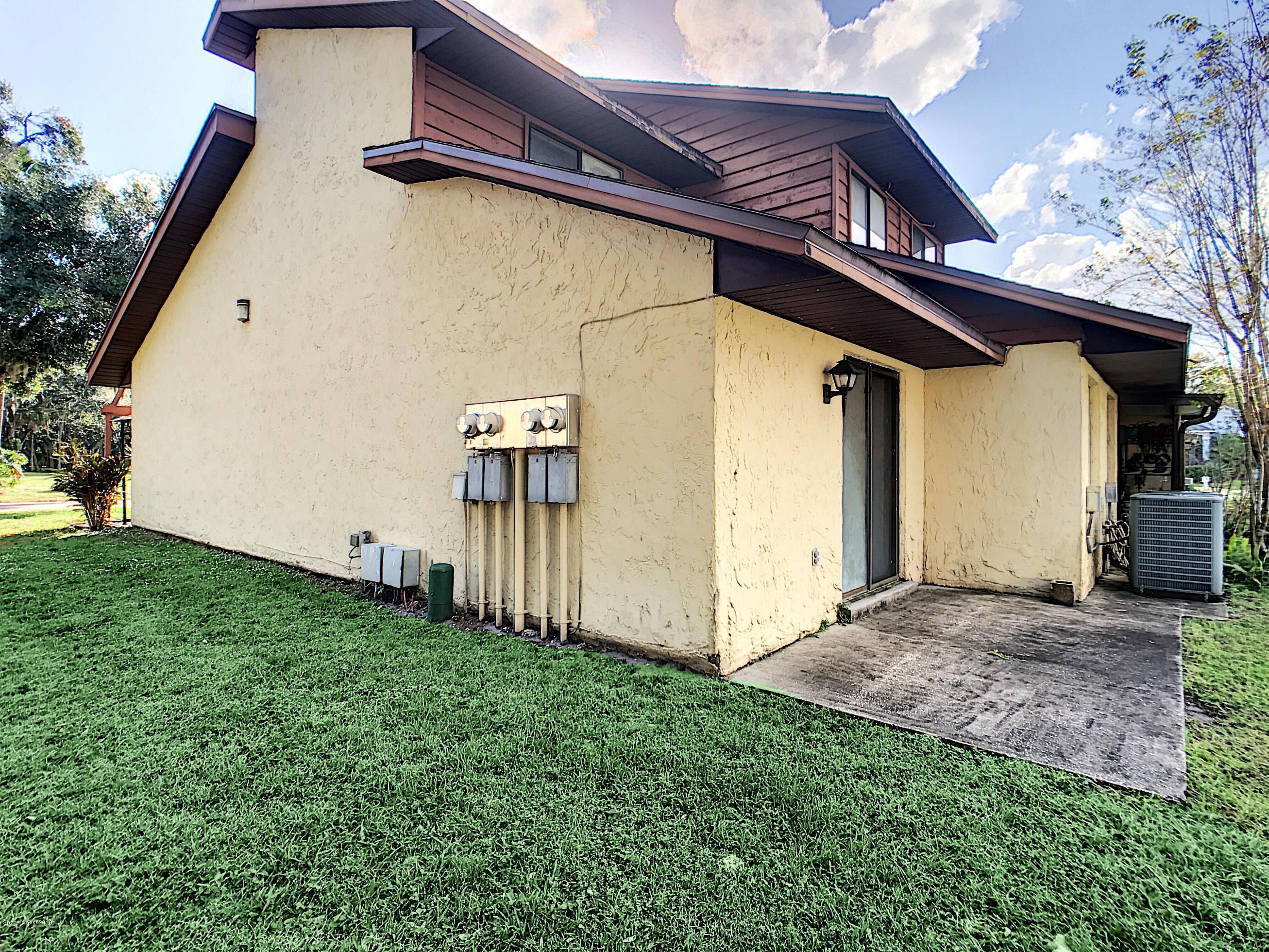 1120 Gary Hunt Road, Unit 3D Cocoa, FL 32926 - Photo 16 of 16 side yard