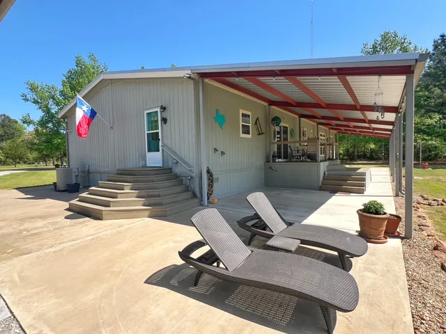 a view of a park with swings and slides