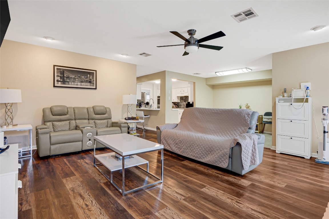 14724 Perthshire Road, Unit C Houston, TX 77079 - Photo 11 of 29 Living room opens to the breakfast area and kitchen.