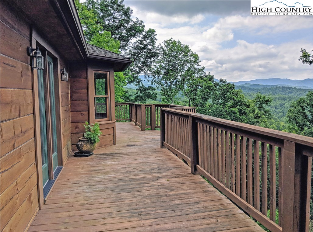 375 Deer Run Road Deep Gap, NC 28618 - Photo 18 of 44 a view of a pathway with a wooden deck