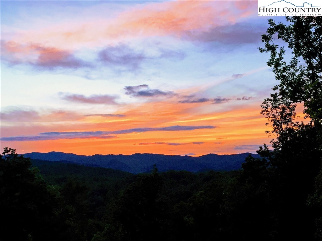 375 Deer Run Road Deep Gap, NC 28618 - Photo 19 of 44 a view of an ocean and mountains