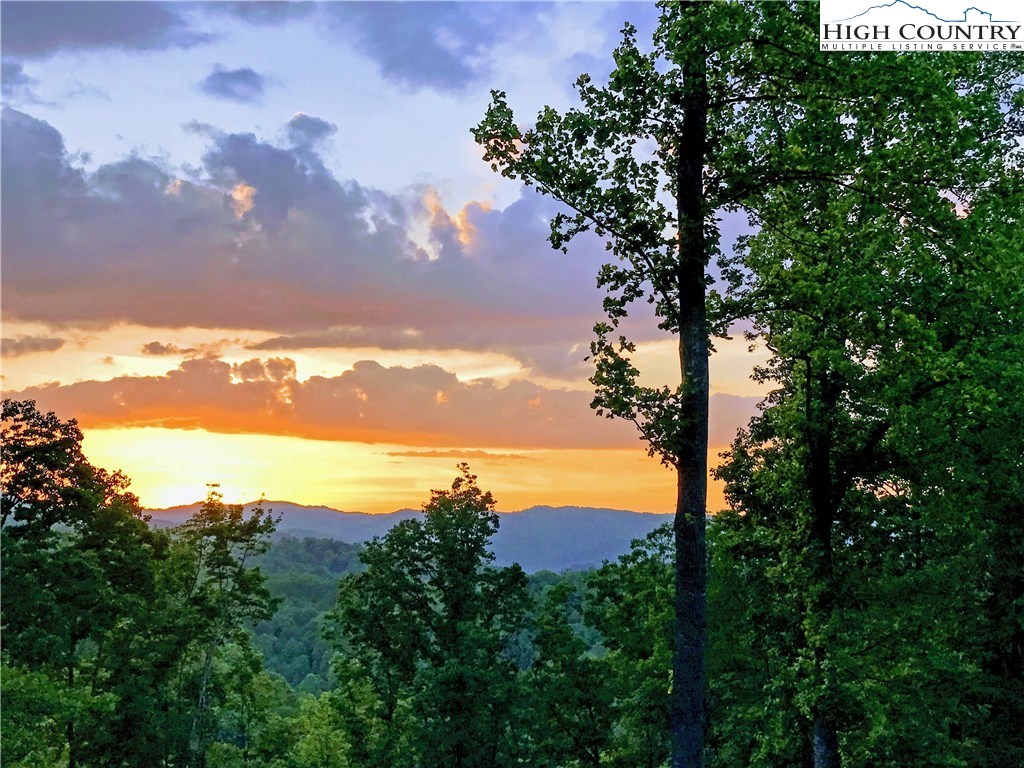 375 Deer Run Road Deep Gap, NC 28618 - Photo 2 of 44 a view of sunset