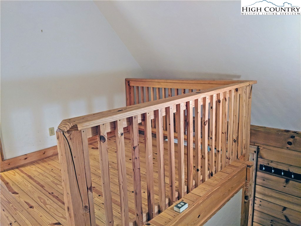 375 Deer Run Road Deep Gap, NC 28618 - Photo 21 of 44 a view of a hallway with wooden floor