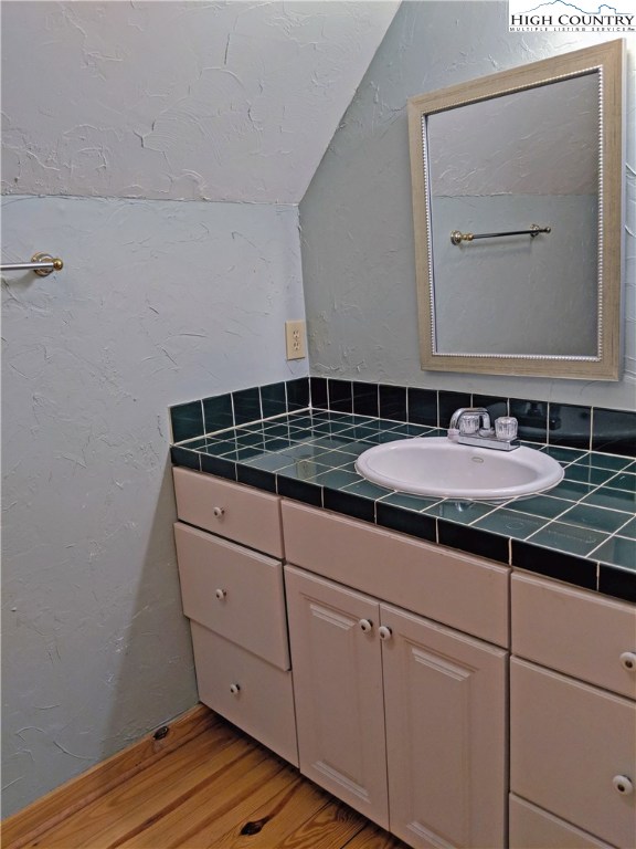 375 Deer Run Road Deep Gap, NC 28618 - Photo 27 of 44 a bathroom with a sink and a mirror
