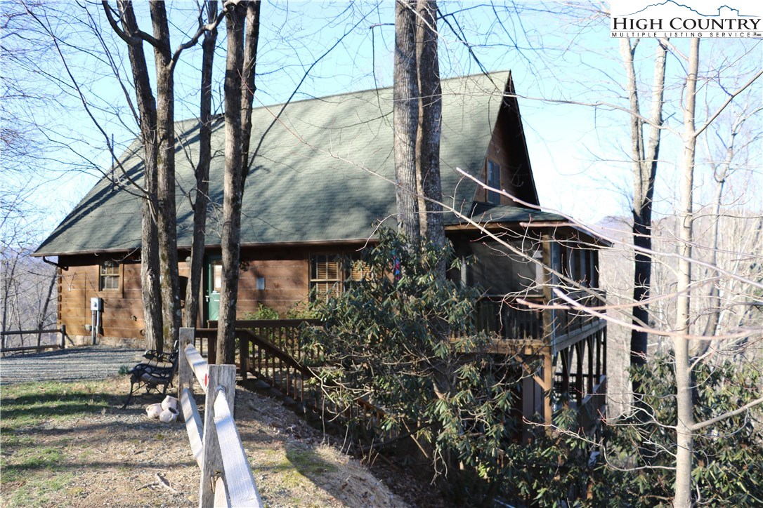 375 Deer Run Road Deep Gap, NC 28618 - Photo 34 of 44 a view of a house with a tree