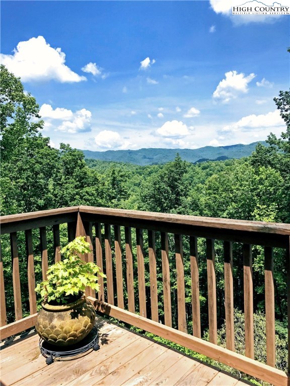 375 Deer Run Road Deep Gap, NC 28618 - Photo 4 of 44 a view of a balcony with wooden floor