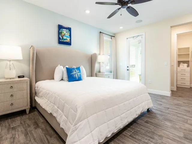a bathroom with a sink mirror vanity and toilet