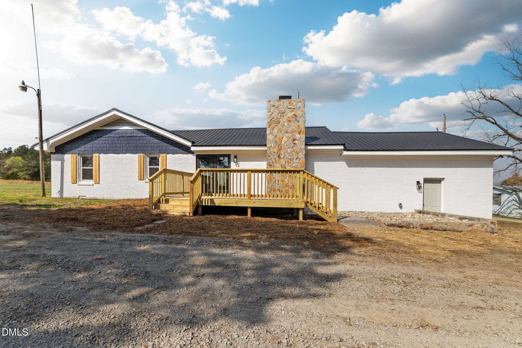 426 Rooker Dairy Road Norlina, NC 27563 - Photo 3 of 33 a house view with a garden space