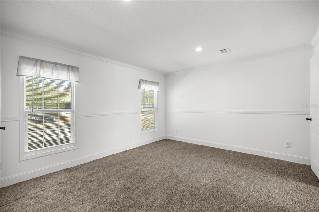 1550 Northeast 162nd Street Citra, FL 32113 - Photo 15 of 33 an empty room with windows