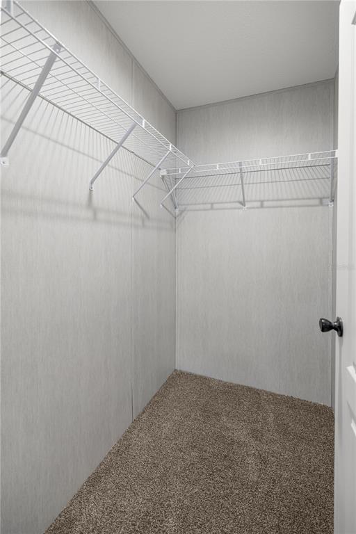1550 Northeast 162nd Street Citra, FL 32113 - Photo 26 of 33 a view of a room with racks on the wall