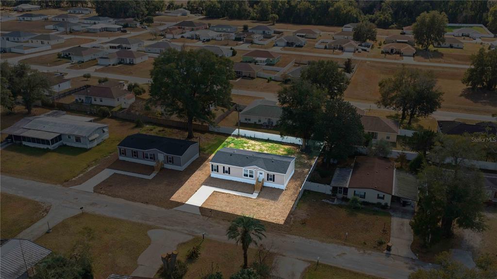 1550 Northeast 162nd Street Citra, FL 32113 - Photo 32 of 33 an aerial view of a house with a yard