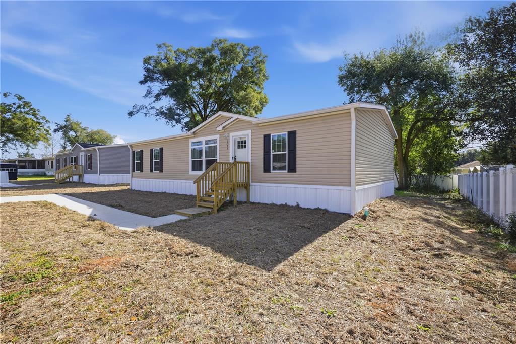 1550 Northeast 162nd Street Citra, FL 32113 - Photo 5 of 33 a view of a house with a yard