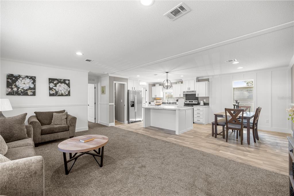 1550 Northeast 162nd Street Citra, FL 32113 - Photo 10 of 33 a living room with furniture and kitchen view