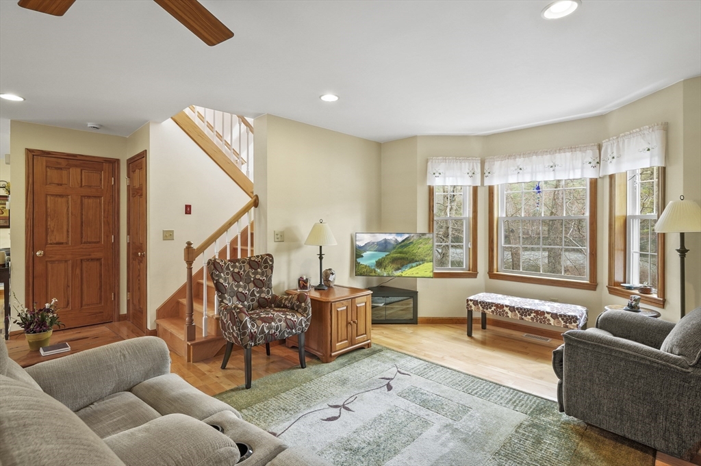 96 Pierpont Road Dudley, MA 01571 - Photo 12 of 42 a living room with furniture and a large window