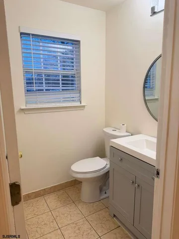 a kitchen with stainless steel appliances a refrigerator sink and cabinets