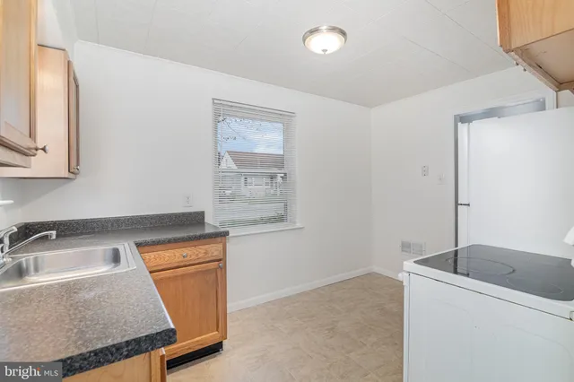 a bathroom with a sink and a bathtub