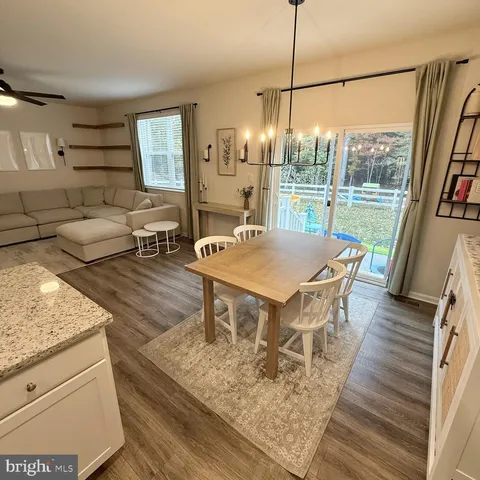 a living room with a couch and a table