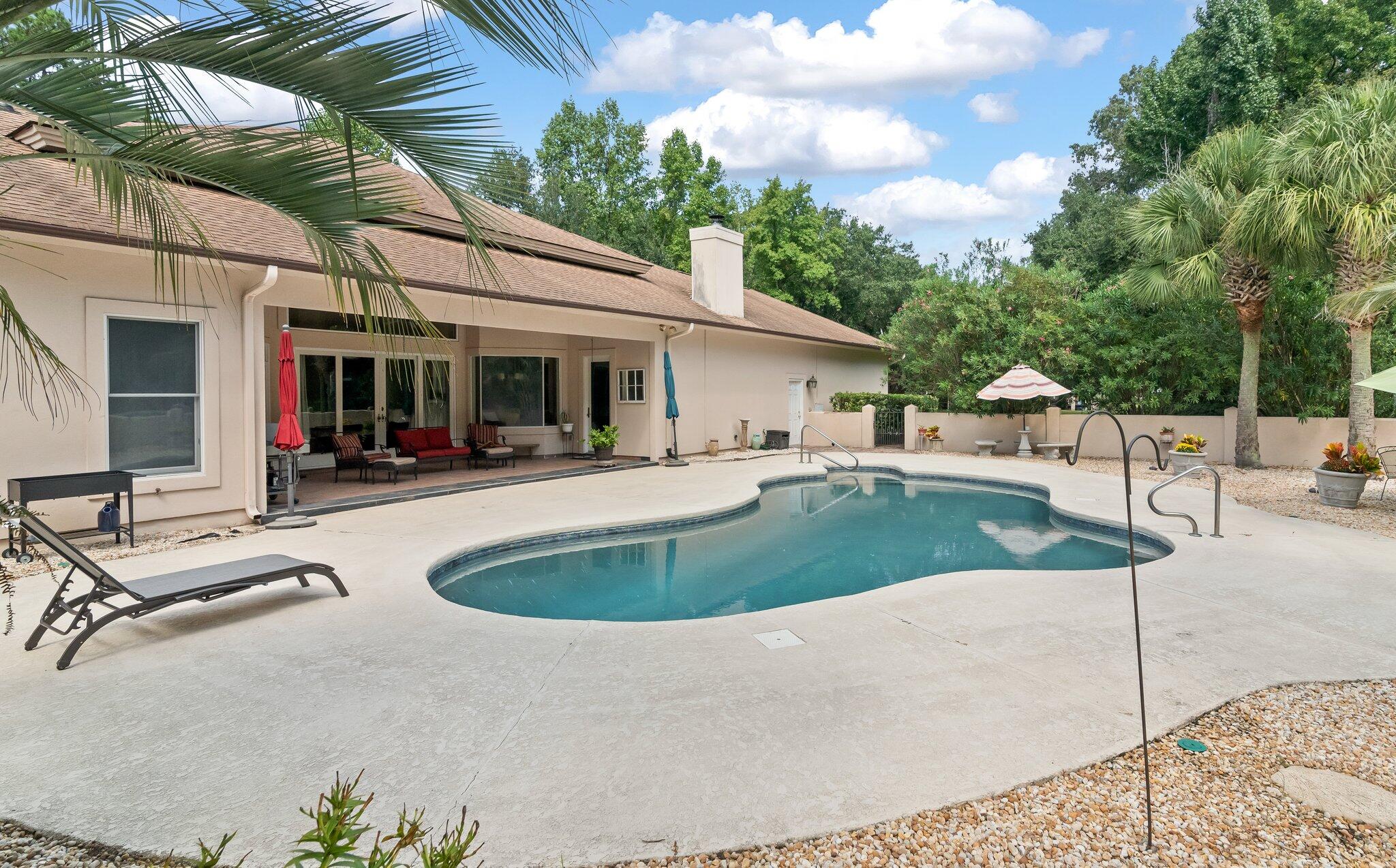 6036 Postell Drive Ravenel, SC 29470 - Photo 23 of 49 Pool and Lanai