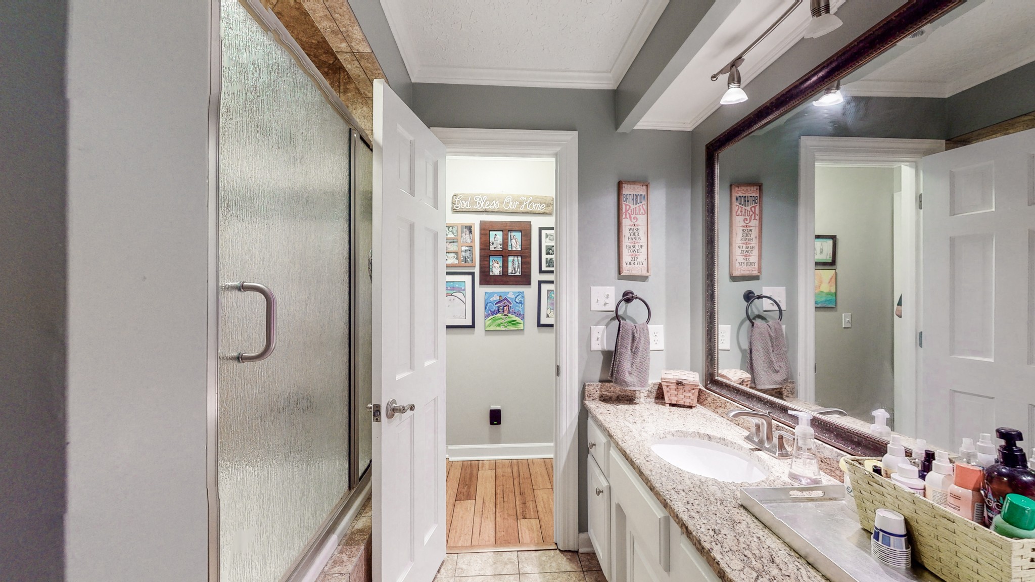 207 Bethlehem Road Lebanon, TN 37087 - Photo 16 of 35 a bathroom with a granite countertop tub sink and mirror